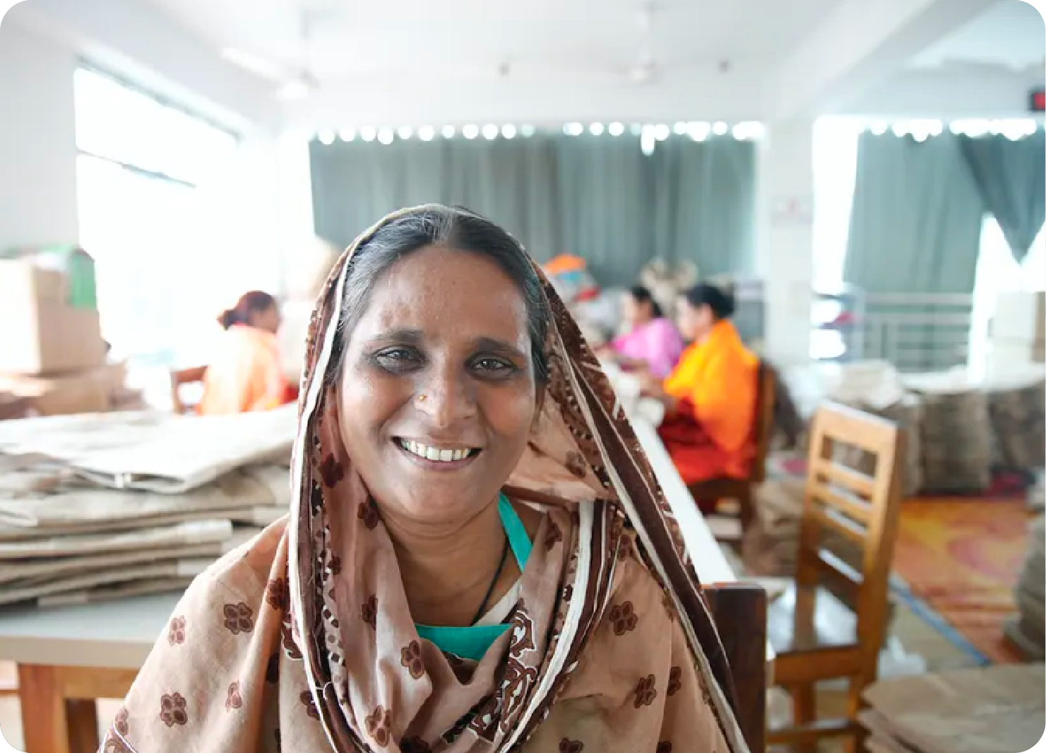 A woman making an Apolis Market bag.